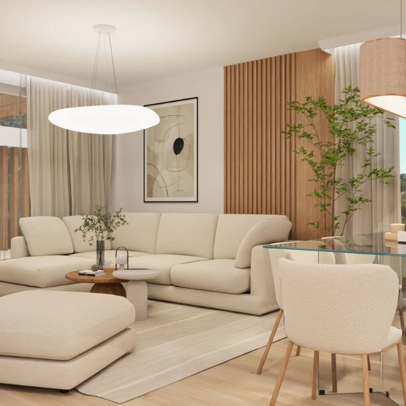 Nowoczesny salon w stylu japandi z jasną sofą, drewnianymi akcentami i roślinnością